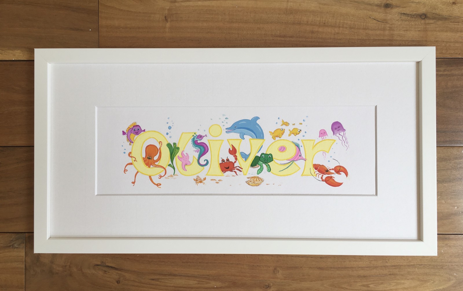 Oliver. Theme: Sea Life. Mixed media on illustration paper. White frame.