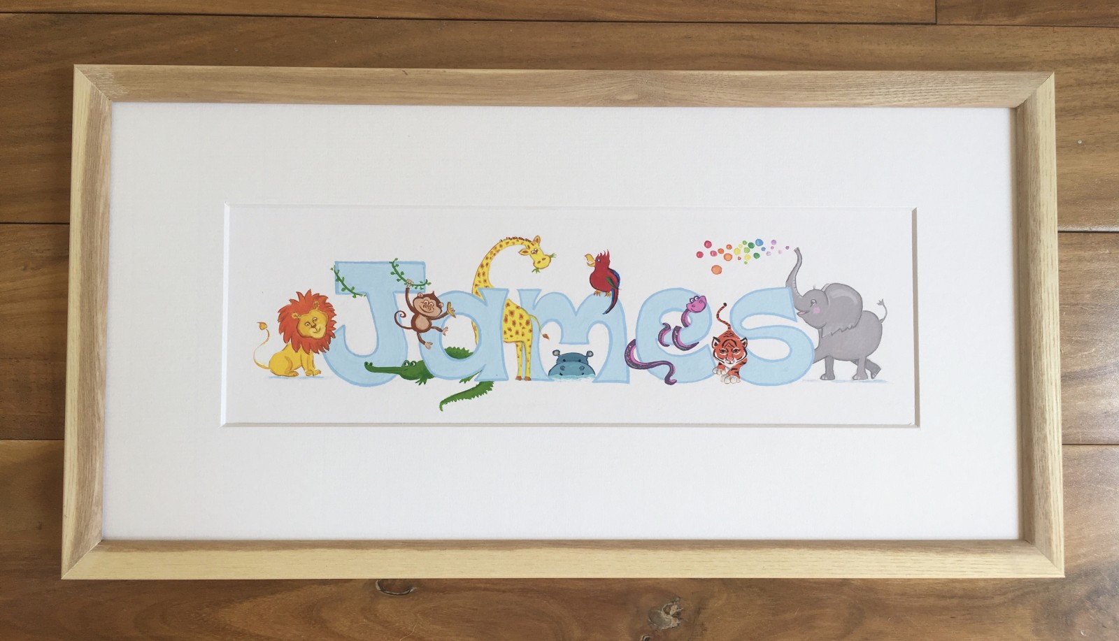 James. Theme: Jungle/Safari. Mixed Media on illustration paper.  Natural wood frame.